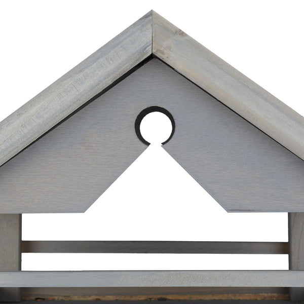 Grijs vogelvoederhuisje op standaard