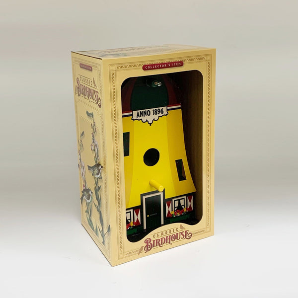 Vogelhuis gele poldermolen met wiek