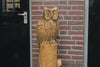 Houtsculptuur uil op stam